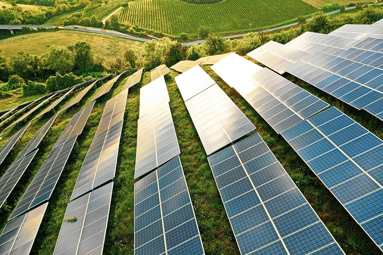 solar Panels Fields On The Green Hills